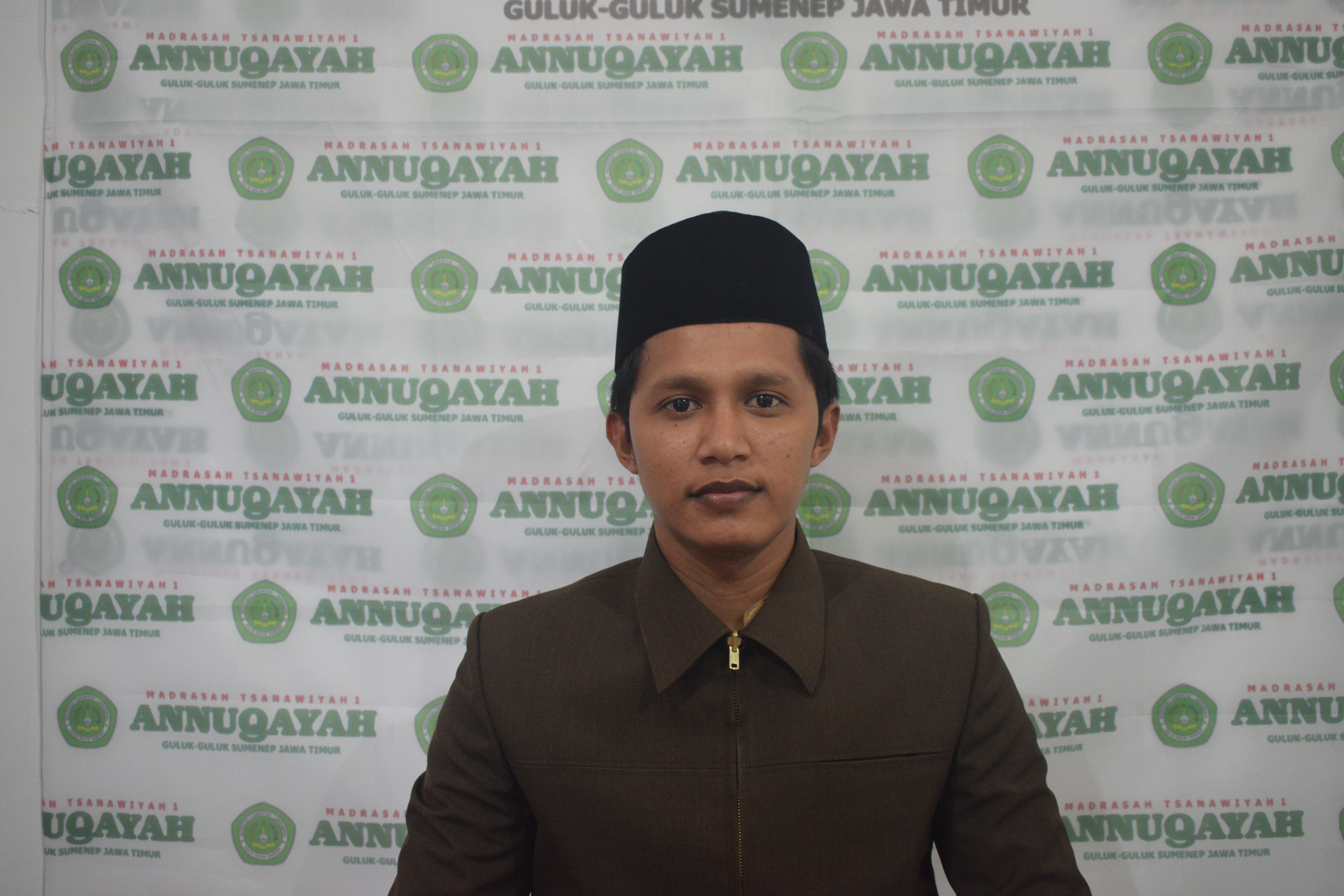 Ilhamdi, S.Pd.